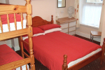 Holiday Flats Blackpool - Apartment 4 Bedroom. Double bed, bunk beds.